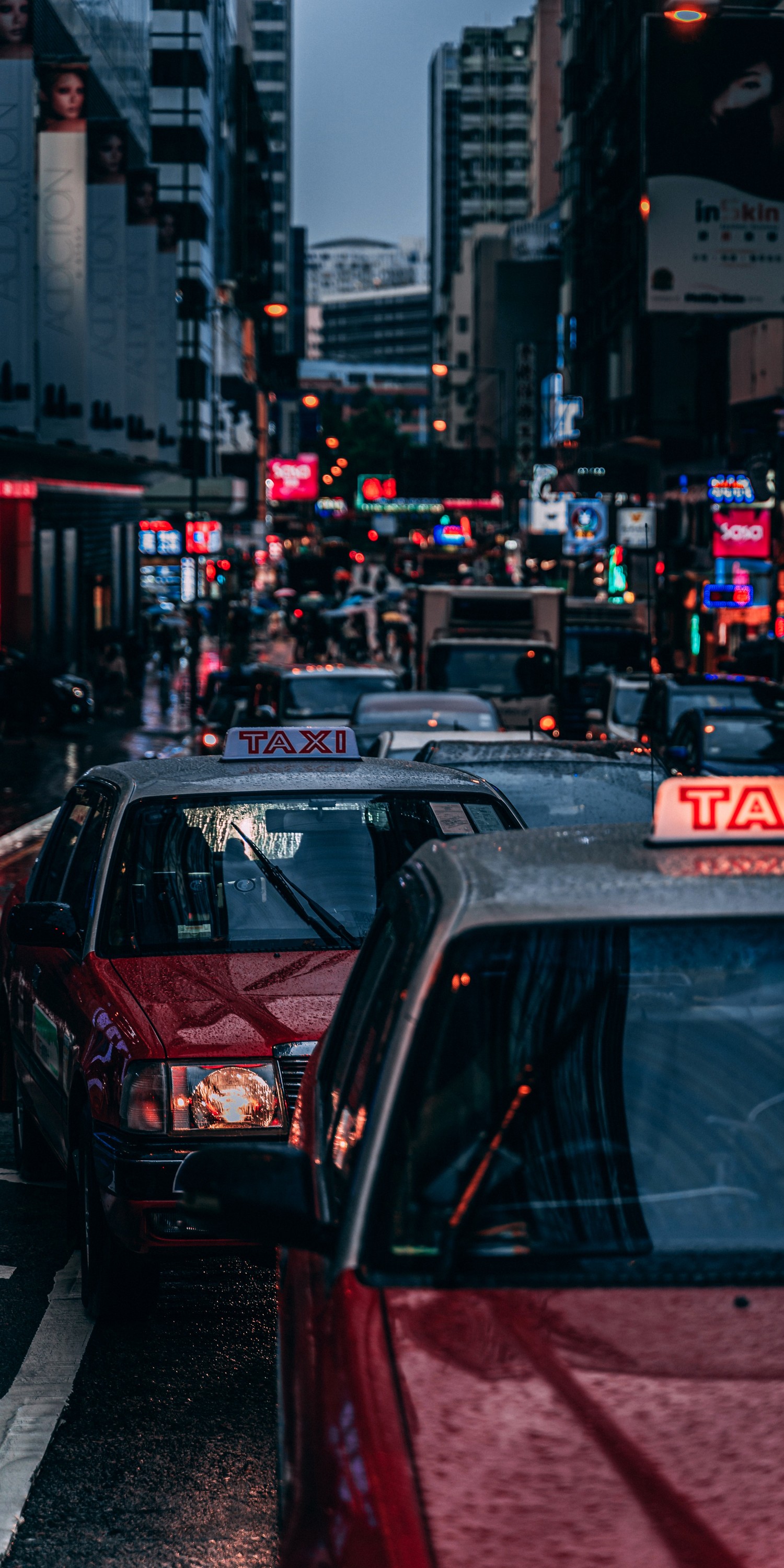 Vivez la Vitalité de la Vie Urbaine avec Notre Fond d'Écran de Taxis