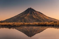 Breathtaking Reflection of a Mountain at Dusk