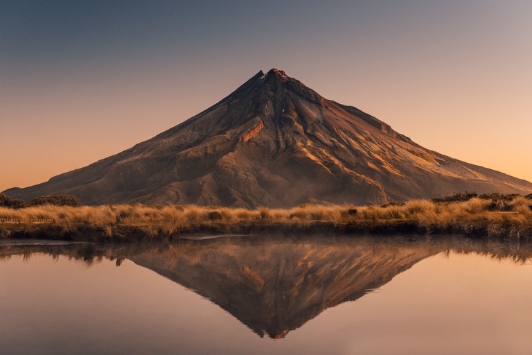 Breathtaking Reflection of a Mountain at Dusk