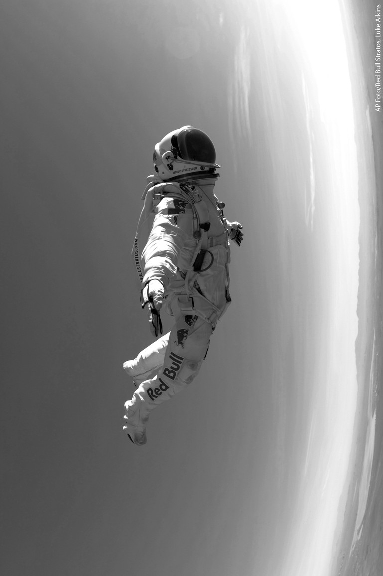 Explore the Universe with Our Astronaut Wallpaper