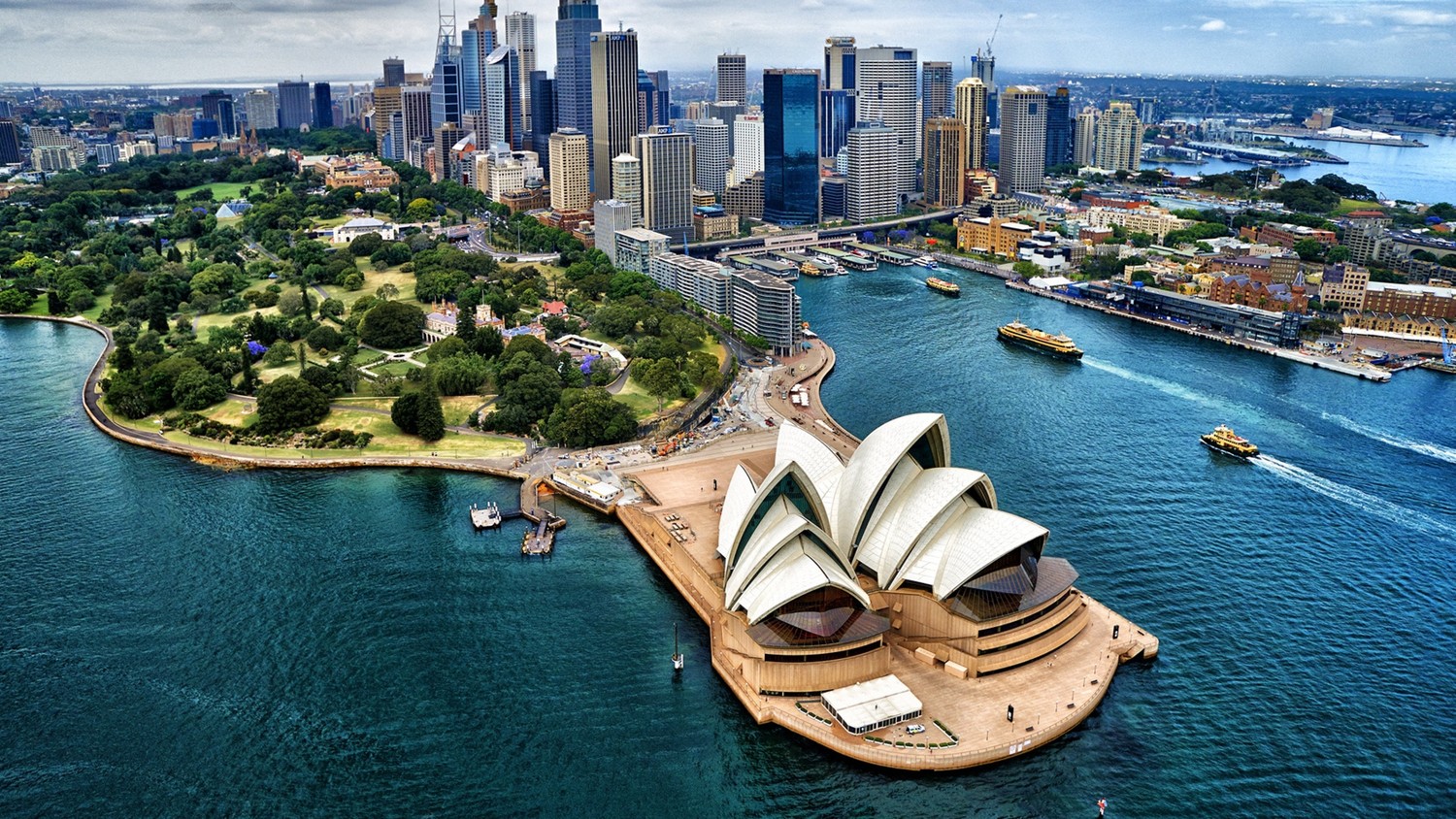 Explore the Vibrant Cityscape of Sydney with this Stunning Wallpaper