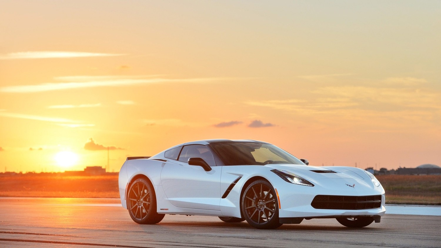 Chevrolet Corvette C7 Wallpaper - A Stunning Sports Car at Sunset