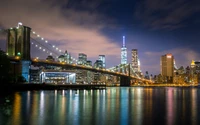 Vista Nocturna Impresionante del Puente de Brooklyn y el Skyline de Nueva York