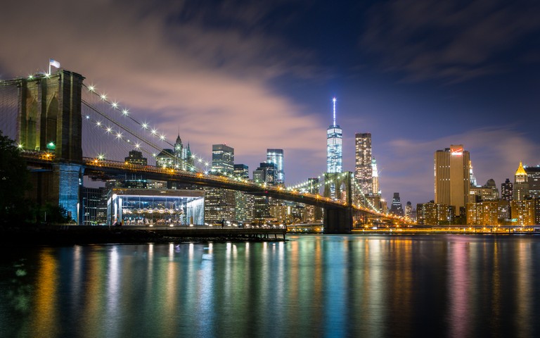 Captivating Nighttime View of Brooklyn Bridge and NYC Skyline