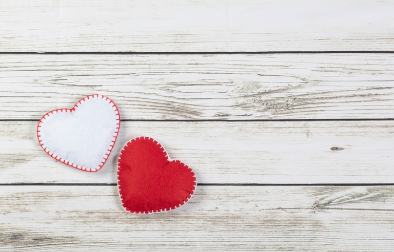 Beautiful Love Hearts on a Wooden Background Wallpaper