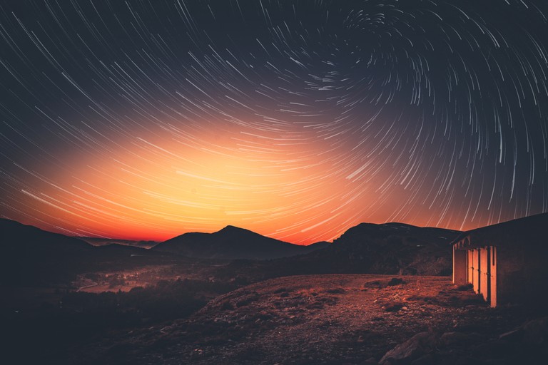 Download Breathtaking Sunset Star Trail Wallpaper