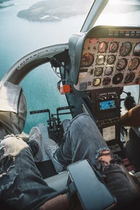 Experience the Thrill of Flight with Our Helicopter Cockpit Wallpaper